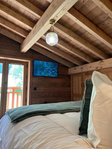Ένα ή περισσότερα κρεβάτια σε δωμάτιο στο Chalet Manala