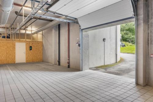 an empty room with an open door in a building at STOR OG LEKKER 2-R på 62 KVM in Trondheim