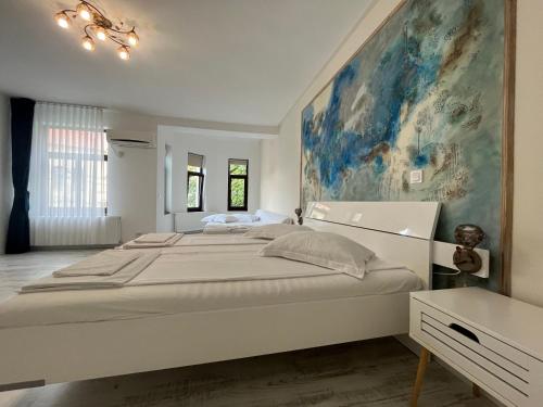 Ένα ή περισσότερα κρεβάτια σε δωμάτιο στο CASA CIUC