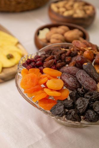 a bowl of dried fruits and vegetables on a table at Can Moio Turismo de Interior in Montuiri