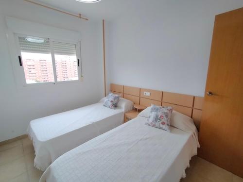 En eller flere senge i et værelse på ACV - Torremar-2ª linea planta 5 frontal 3