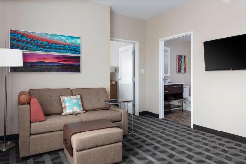 a living room with a couch and a chair at TownePlace Suites El Paso North in Sunrise Acres