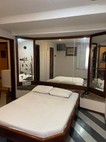 Katil atau katil-katil dalam bilik di Verona Hotel
