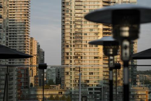 a view of a city with tall buildings at The Parker Hotel and Rooftop in Vancouver