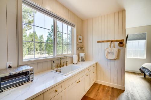 a kitchen with a sink and a window at Modern Studio in Bend about 3 Mi to Sunriver Resort! in Bend