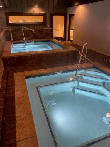 a jacuzzi tub in a hotel room at Vail Racquet Club Mountain Resort in Vail