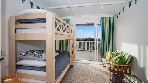 Voodi või voodid majutusasutuse MaiMoana - Hatfields Beach Cliff-Top Retreat toas