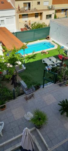 A view of the pool at Bem Me Quer or nearby