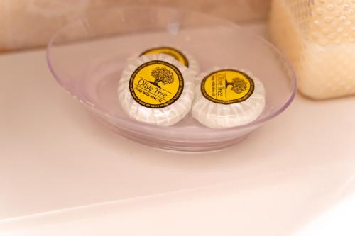 two balls of food in a bowl on a table at Theoxenia Kasos Luxury Apartments in Panayía
