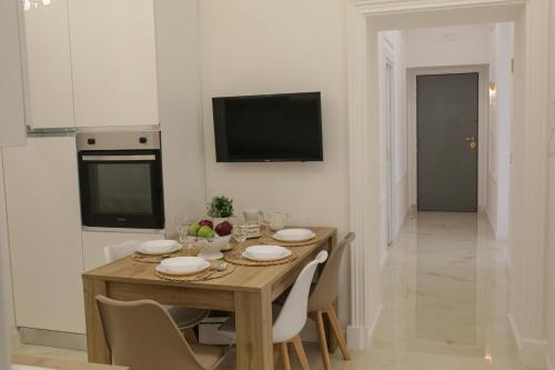 Una televisión o centro de entretenimiento en Ferdinando's Home