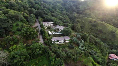 an aerial view of a house in a forest at The Retreat Costa Rica - Wellness Resort & Spa in Atenas