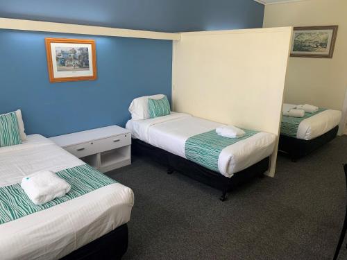 Postel nebo postele na pokoji v ubytování Arkana Motel
