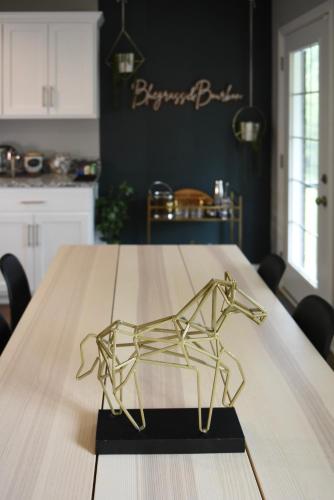 a gold origami dog on a table in a kitchen at Bluegrass & Bourbon - a Peaceful Retreat & Hangout in Bardstown