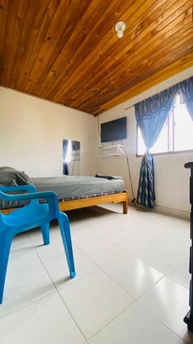 Ένα ή περισσότερα κρεβάτια σε δωμάτιο στο Hostal macajan
