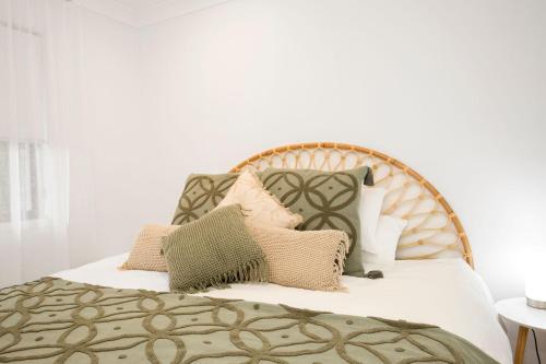Una cama o camas en una habitación de Vincentia Views
