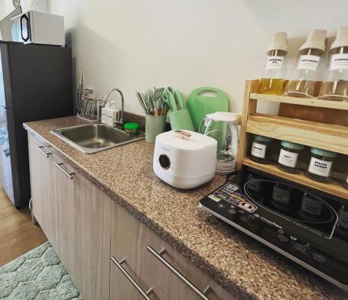 Kuchyň nebo kuchyňský kout v ubytování ASG Davao Staycation