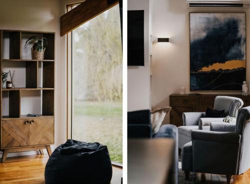 a living room with a chair and a window at Park Crescent - Daylesford Macedon Region in Kyneton