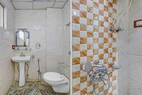 a bathroom with a toilet and a sink and a shower at Hotel O Shaani Guest House in Jawāharnagar