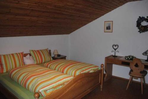 Un pat sau paturi într-o cameră la Braun Hof