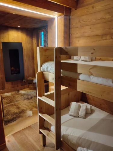 Una cama o camas cuchetas en una habitación  de Chalet 1400