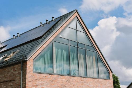 a roof of a house with a lot of windows at Szklany Przystanek in Kościerzyna