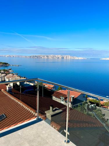 a view of the ocean from a balcony at Villa Panorama in Senj