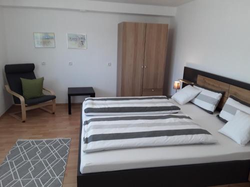 Postel nebo postele na pokoji v ubytování Ferienwohnung Bieniussa 3