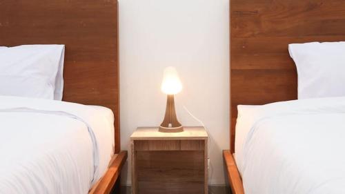 Ένα ή περισσότερα κρεβάτια σε δωμάτιο στο Donna's Hus