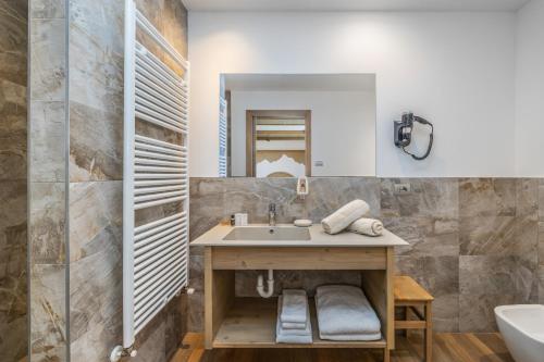 Kúpeľňa v ubytovaní Miraval Hotel