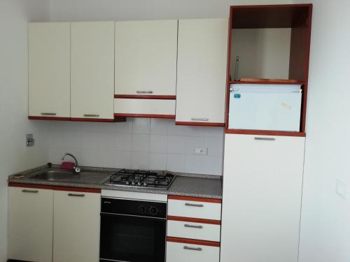 Кухня или кухненски бокс в appartamento genziane