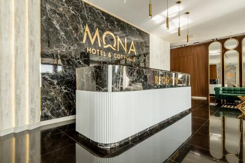 Lobbyen eller receptionen på Mona Hotel and Cottages