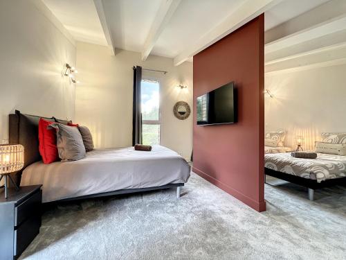Ένα ή περισσότερα κρεβάτια σε δωμάτιο στο Chalet Utopia