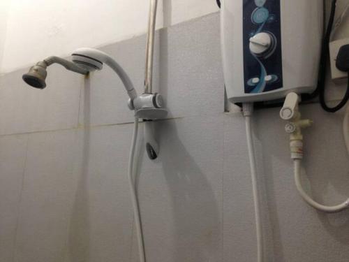 a bunch of wires are hooked up to a wall at Vegan Stay by The Vegan Kitchen by Sulo in Boralesgamuwa