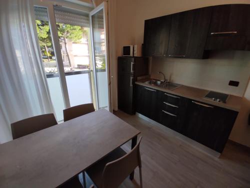 A kitchen or kitchenette at Residence Renadoro
