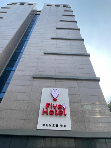 a sign on the side of a five hotel building at Five hotel Jongno in Seoul