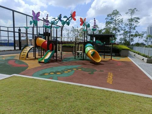 a playground with a slide in a park at Cozy Sky Loft 5 Guests with Netflix & Facilities L28 in Johor Bahru