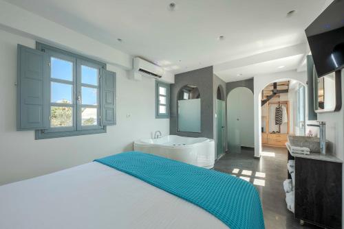 Postel nebo postele na pokoji v ubytování BlackStone Luxury Suites