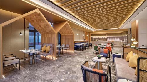 Area soggiorno di Hilton Garden Inn Liaocheng Jiangbei Shuicheng