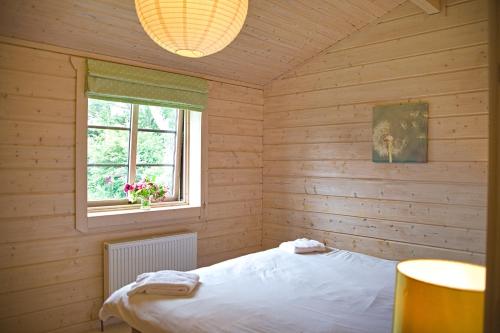 Katil atau katil-katil dalam bilik di Skylark Lodge
