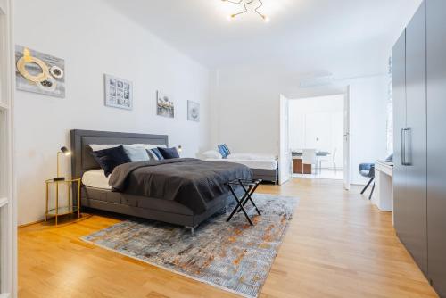 Ένα ή περισσότερα κρεβάτια σε δωμάτιο στο 120 m2 4-rooms apartment in a city center