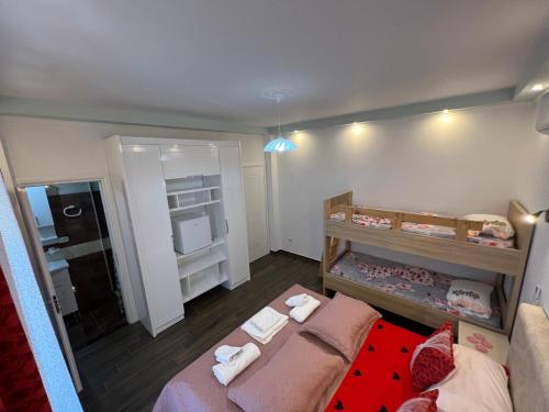 Ein Bett oder Betten in einem Zimmer der Unterkunft Adriatik Guesthouse