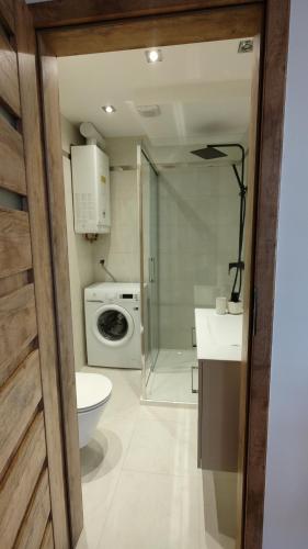 Ванная комната в Darłówko Apartament Morski XIII