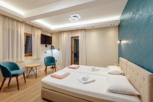 Un ou plusieurs lits dans un hébergement de l'établissement Guesthouse Villa Stari Grad