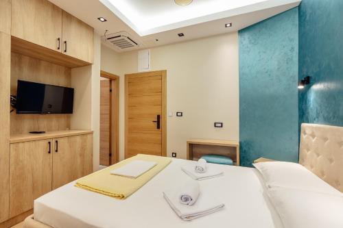 Un ou plusieurs lits dans un hébergement de l'établissement Guesthouse Villa Stari Grad