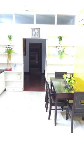 a dining room with a table and chairs at Moydom Nice & Cosy Private 1 BHK Apartment OPP NFC market in New Delhi