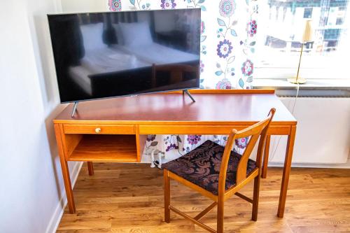 TV a/nebo společenská místnost v ubytování Saga Hotell
