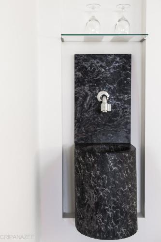 a black marble counter with a lock on it at Genusshotel Riegersburg in Riegersburg