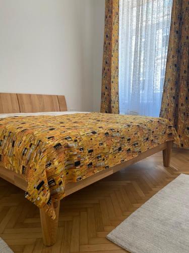 Postel nebo postele na pokoji v ubytování Klimtsuites