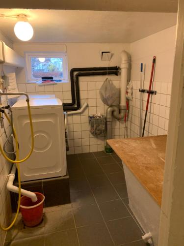 a bathroom with a sink and a toilet in it at 4 Bed Apartment with balcony in Karlskrona in Karlskrona