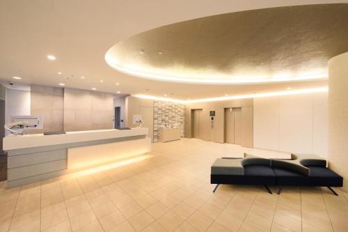 The lobby or reception area at Richmond Hotel Yokohama-Bashamichi